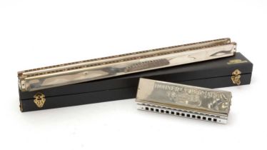 A Hohner bass harmonica and a Hohner chord harmonica