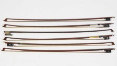 Six assorted violin bows