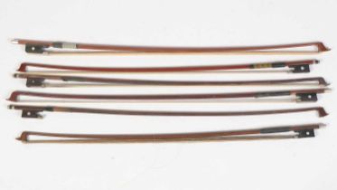 Five violin bows, cello bow