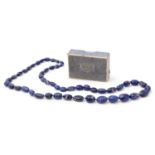 A 1920s single-strand necklace of graded lapis lazuli beads