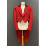 A Moss Brothers vintage hunting pink tailcoat