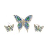 A 1930s butterfly brooch and pendant earring set