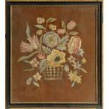 A 19th Century needlework picture depicting a basket of blooms