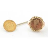 Gold coin tie pin and a ring