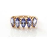 A five stone tanzanite ring