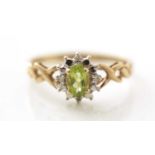 A peridot and diamond cluster ring