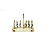 A silver seven bar toast rack, by William Batt & Sons