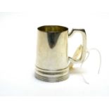 A silver tankard, by Walker & Hall