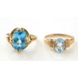 Two blue topaz rings