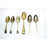 A selection of silver table spoons, and a gravy spoon