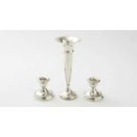 A silver trumpet vase, and a pair of silver dwarf candlesticks