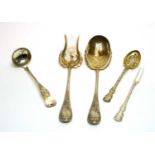 A pair of servers, a sterling silver pickle fork and spoon and a ladle