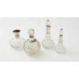 Four silver mounted cut glass scent bottles