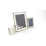 Three silver mounted photograph frames