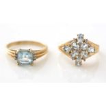 Two topaz and diamond rings