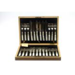 A set of twelve fish knives and forks