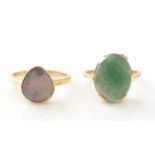 An opal ring, and an aventurine quartz ring