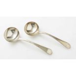 A pair of George III silver sauce ladles, by Eley and Fearn