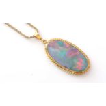An opal pendant on chain