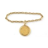 A Napoleon III gold 20 Francs coin, on chain