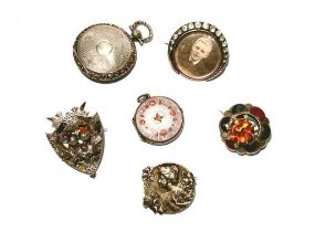 A collection of brooches; and other items