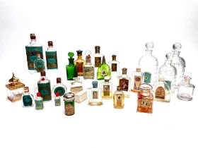 A collection of antique and vintage glass perfume bottles | including "Shem-el-Nessim" (1906)