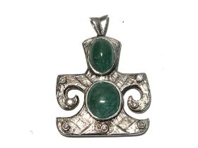 A diamond and greenstone pendant