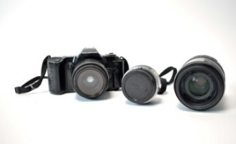 An Olympus OM-101 autofocus SLR camera and lenses