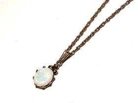 An opal pendant on chain