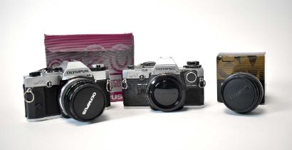 Two Olympus SLR cameras