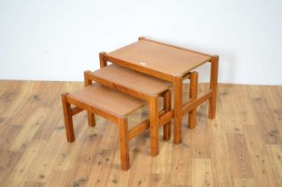 A mid century Danish inspired teak nest of graduating tables