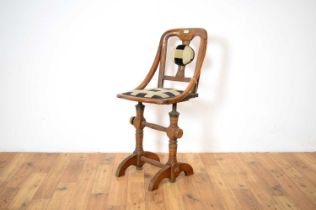 A Victorian walnut 'Patent Music Chair'