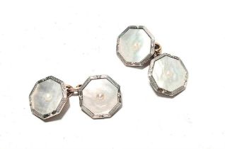 A pair of pearl cufflinks