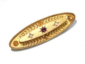 A Victorian 15ct yellow gold, ruby and seed pearl brooch