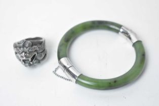 A Chinese silver dog of foo pattern ring; and a bangle