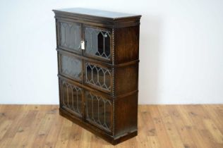 A 1920s oak three section bookcase by Simpoles Chapter