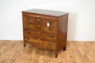 A Georgian mahogany and banded chest of drawers