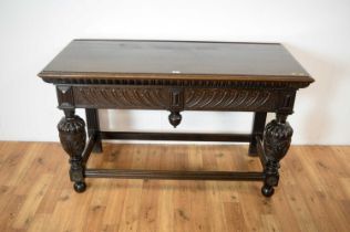 A late 19th Century oak side table in the Flemish taste