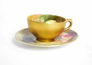 A Royal Worcester miniature cup and saucer