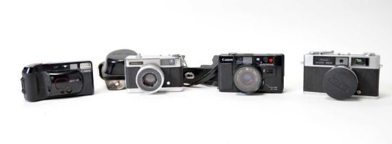 Compact cameras by Canon, Ricoh and Yashica