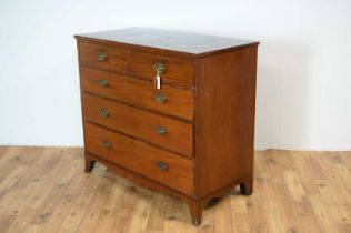 A Georgian mahogany and banded chest of drawers