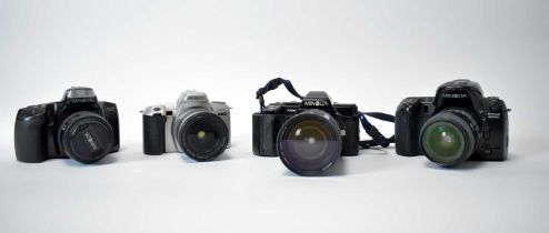 Four Minalta SLR cameras