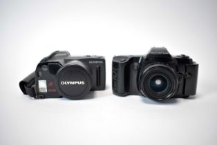 Two Olympus cameras