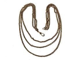 A 9ct gold triple row necklace