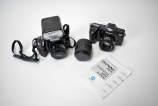 Two Minalta Dynax auto focus cameras, lenses and flashgun