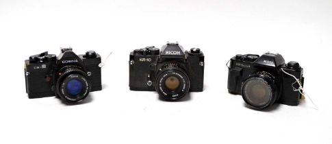 Two Ricoh cameras and a Cosina camera