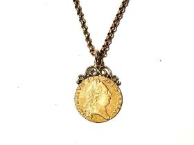 A George III gold spade guinea on chain