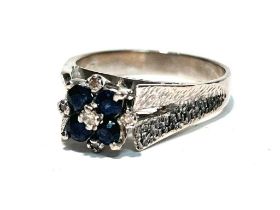 A sapphire and diamond ring