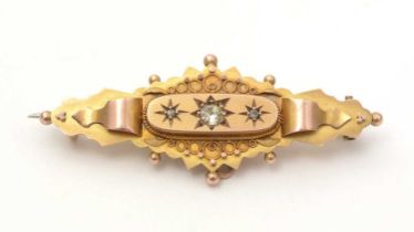 A Victorian style diamond bar brooch