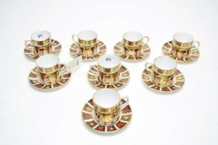 A set of eight Royal Crown Derby cups and saucers